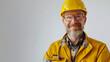worker in a yellow helmet on a white background with copy space