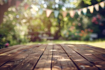 Wall Mural - Wooden table top with a blurred background of a garden party atmosphere.