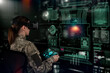 Military Think Tank, AI technology in the army. Warfare analytic operator checking coordination of the military team. Military commander with a digital device with vr glasses operating troops