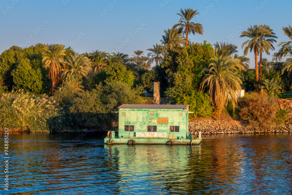 Floating pump station, water pumping for irrigation on the Nile river ...
