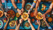 © Daniel - A group of friends gather around a table enjoying a colorful feast of various dishes and cuisines