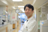 Fototapeta  - Portrait of Dedication: Japanese Male Doctor Captured at the Hospital