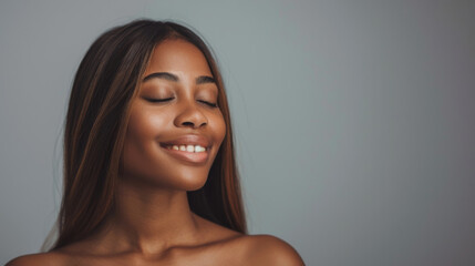 Wall Mural - young woman with closed eyes, a serene expression,