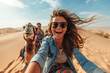 
Happy tourist having fun enjoying group camel ride tour in the desert - Travel, life style, vacation activities and adventure concept
