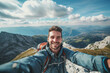 
Young hiker man taking selfie portrait on the top of mountain - Happy guy smiling at camera - Tourism, sport life style and social media influencer concept