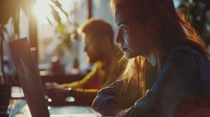 Sticker - A woman sitting in front of a laptop computer. Suitable for business and technology concepts