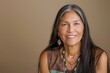 © Karl - Smiling Middle Aged Native American Woman with Traditional Necklace