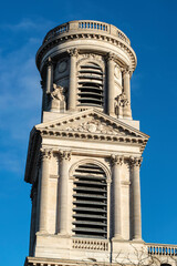 Wall Mural - Paris, France - Dec. 27 2022: One of the Church tower in St-Sulpice church