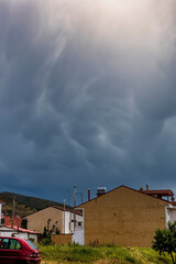 Wall Mural - clouds over the city