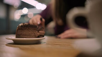 Wall Mural - A close-up Decadent Chocolate Cake on White Plate