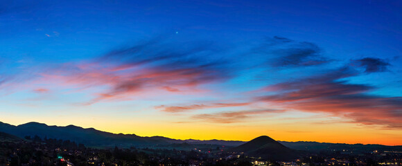 Wall Mural - Panorama of sunset, sunrise, over mountains, sky