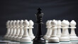 © emotionpicture - white chess king standig ahead of black pawns, white background
