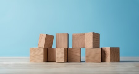 Poster -  Simplicity in design - Wooden blocks against a blue backdrop