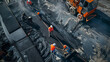 top view of Worker operating asphalt paver machine during road construction and repair works, workers and the asphalting machines road work