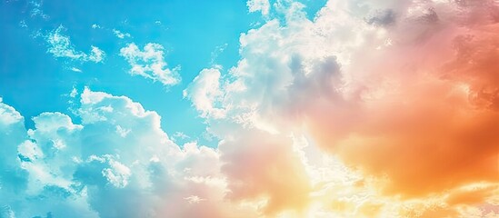 Canvas Print - A commercial airplane soars through the cloudy blue sky, its wings cutting through the billowing white clouds. The vibrant blue and orange hues create a striking contrast against the metallic aircraft