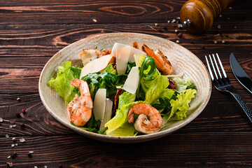 Poster - Lunch salad of shrimp, avocado, sun-dried tomatoes, parmesan cheese, lettuce and arugula.