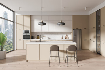 White and beige kitchen interior with island