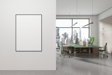 White and green open space office interior with poster