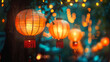 Illuminated traditional Chinese lanterns glowing warmly against a bokeh background of sparkling lights at dusk.