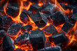 Glowing coal or pieces of wood. Fire embers close up

