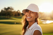 Portrait of young smiling woman on the golf course
