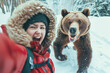 tourist take selfie while running out from angry bear in snow forest
