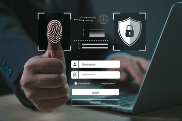 Man using thumb to scan finger print or for access password digital processing biometric identification to access security system includes internet banking, mobile phone , Cyber safety concept.	
