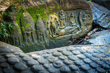 Ancient stone carving at Kbal Spean the mystery waterfall on Kulen mountains in Siem Reap province of Cambodia.