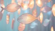 A serene display of fish-shaped pendants hanging against a soft, light blue background, creating a calming visual suitable for spa or wellness center decor or a peaceful April Fools' Day background
