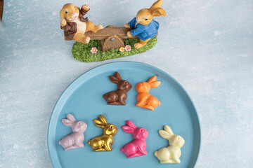 Wall Mural - Small colorful milk chocolate and white chocolate bunnies_1.