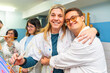 © unai - Man with down syndrome embracing his painting teacher