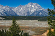Mt. Moran in the Grand Tetons standing tall above the snow-dusted Snake River valley