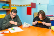 © unai - People with intellectual disabilities knitting clothes with wool