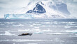 Boat sails through icebergs in Antarctica