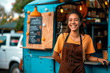 Fototapeta Panele - smiling food vendor standing in front of an open food truck