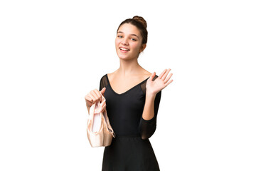 Sticker - Teenager girl practicing ballet over isolated chroma key background saluting with hand with happy expression