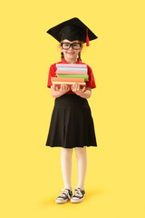 Sticker - Little girl in graduation hat with books on yellow background. End of school year