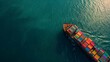 © PSCL RDL - a large container ship carrying colorful containers in the ocean sea.