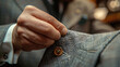 close up of male hand sewing a high end coat