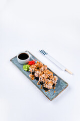 Poster - Fresh rolls with salmon, fried onion, cream cheese, ginger, wasabi and soy sauce.