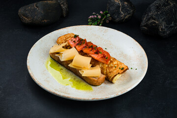 Wall Mural - Breakfast fried omelette with tomatoes, cheese and bread.