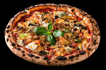 Wall Mural - Italian dinner pizza with eggplant, cheese, tomatoes, basil, tomato sauce and spices isolated on black.