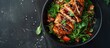 A bowl filled with a combination of tender teriyaki chicken, crisp vegetables, and sesame seeds, creating a delicious and nutritious salad option.