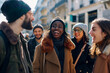 Friends strolling on a trip, interracial group of young people on a winter vacation in a foreign city
