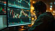 Trader Monitoring Stock Market Charts on Multiple Computer Screens