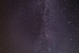 Fototapeta Tęcza - Amazing night sky with stars in countryside. Beautiful starry sky. Milky way galaxy
