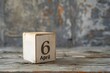 wooden calendar with date 6 april on wooden background, International Tartan Day; International Carbonara Day; World Table Tennis Day; International Day of Sport for Peace and Development