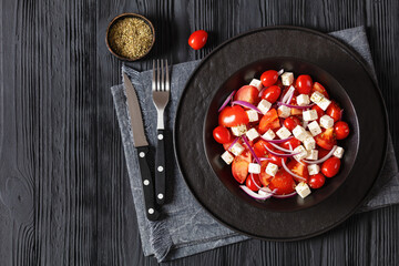 Canvas Print - tomato salad with red onion and white cheese