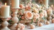  a table topped with lots of white vases filled with lots of pink flowers and greenery next to a row of tall white candles with lit candles on top.