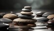 zen background with stacked stone pebbles in water with dark muted colors
